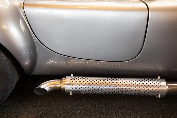 chrome exhaust pipes on a classic racing car retro automobile exhaust system side pipe