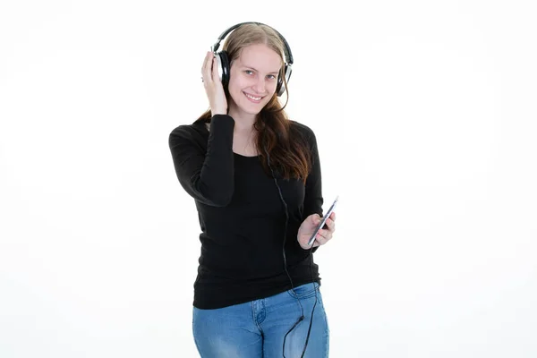 Νεαρή Γυναίκα Τηλέφωνο Στο Χέρι Ακούγοντας Μουσική Ακουστικά Smartphone — Φωτογραφία Αρχείου
