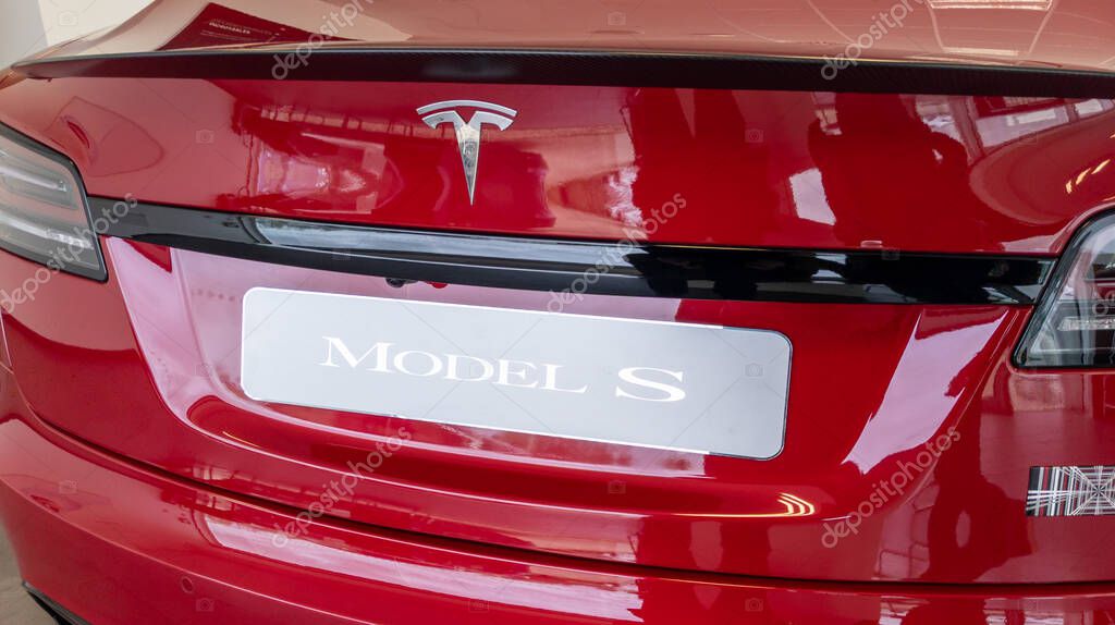 Bordeaux , Aquitaine  France - 03 31 2023 : tesla logo brand and text sign model S rear view rearlight of red sport car backlight red