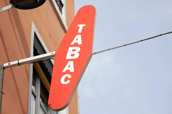 stock image lyon , Aura France - 04 24 2023 : tabac french logo brand and sign text front signboard entrance wall france store tobacco shop facade