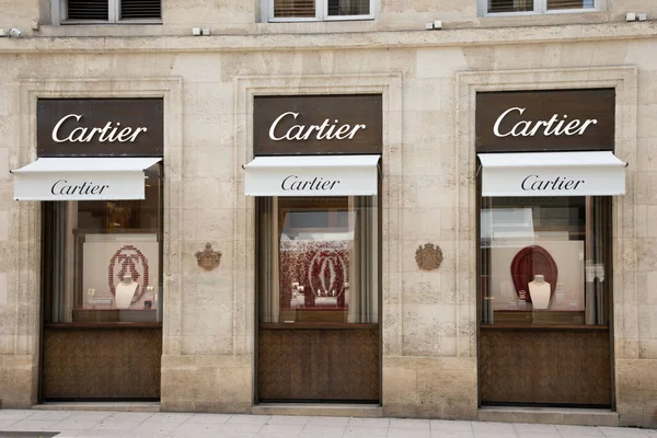 stock image lyon , Aura France - 05 01 2023 : Cartier text sign and logo brand front facade boutique luxury jewellery store