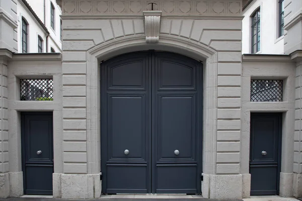 stock image grey wooden front door of street restored house entrance dark gray classic gate