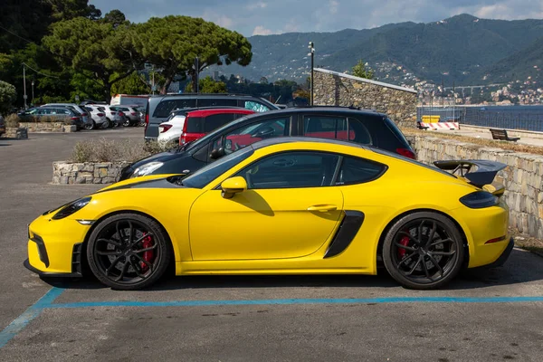 stock image Bordeaux ,  France - 06 27 2023 : Porsche gt4 color yellow side modern sport car in public beach parking