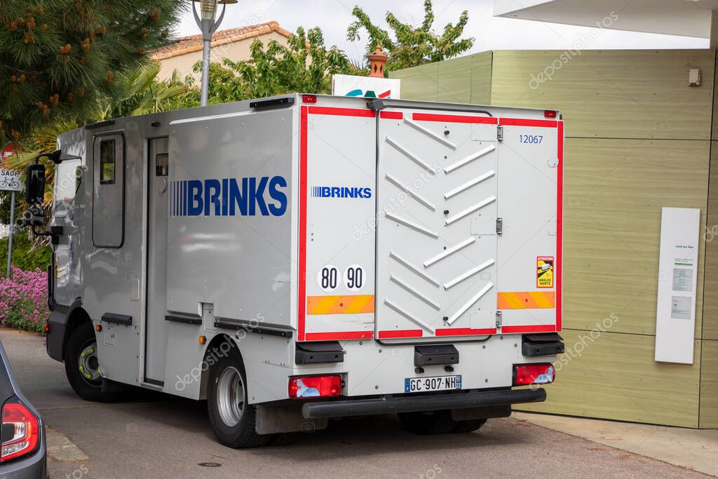 Bordeaux , Aquitaine  France -  07 15 2023 : brinks armored cash transport truck logo brand and text sign on panel van front of bank