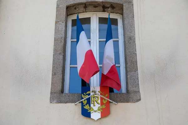French flag and coat of arms text rf french republic of France in city hall facade red blue white colors