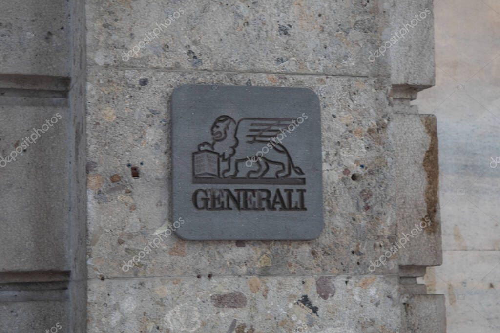 Milan , Italy  - 07 29 2023 : Generali brand logo and text sign on entrance facade wall agency italian office of insurance company