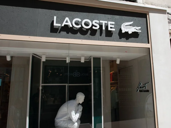 stock image Bordeaux , France -  08 19 2023 : lacoste logo brand and text sign on windows boutique chain facade store fashion city street