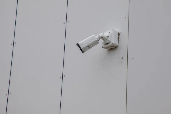 CCTV wall surveillance camera building vision on city center for detecting offenses and secure town population safety