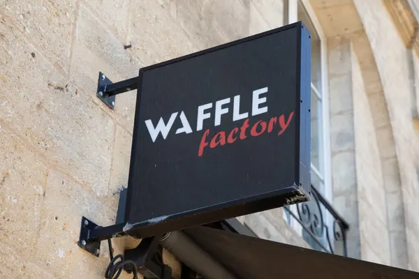 stock image lyon , France - 11 04 2023 : Waffle factory sign logo and brand text facade front of chain fastfood wall entrance restaurant