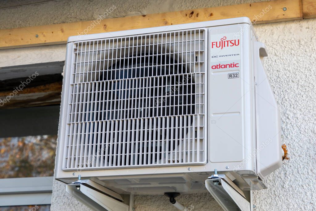 Bordeaux , France - 11 29 2023 : fujitsu atlantic dc r32 inverter air conditioner logo brand and text sign on equipment conditioning outside wall building