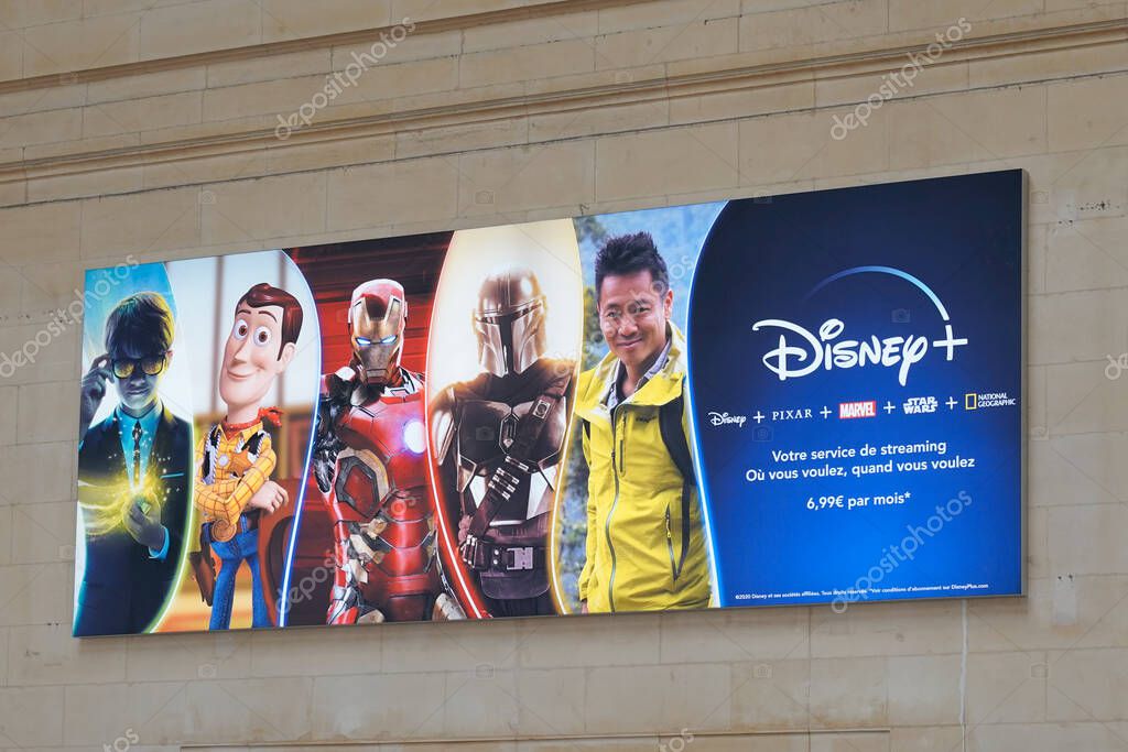 Bordeaux , France - 11 20 2023 : disney+ logo brand and text sign Iron man Marvel comics with  toys story harry potter pixar starwars and national geographic advertising