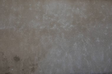 pürüzlü mermer taş desenli arka plan duvar ön cephesi eskimiş eski beton gri doku yıpranmış.
