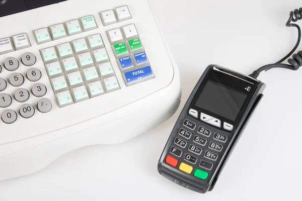 cash register with bank card payment terminal keyboard collector on white background