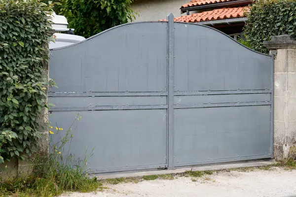 portal street suburb home steel raw gray metal retro house gate garden access door entrance