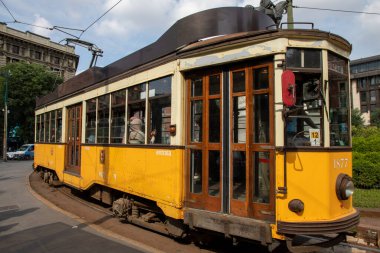 Milan , Italy - 01 02 2023 : Milano ancient old Tram in Lombardia italia yellow streetcar in Milan city Italy