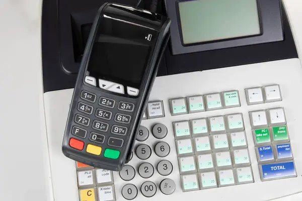 cash register and bank card payment terminal for payment by chip and magnetic bank card in a store