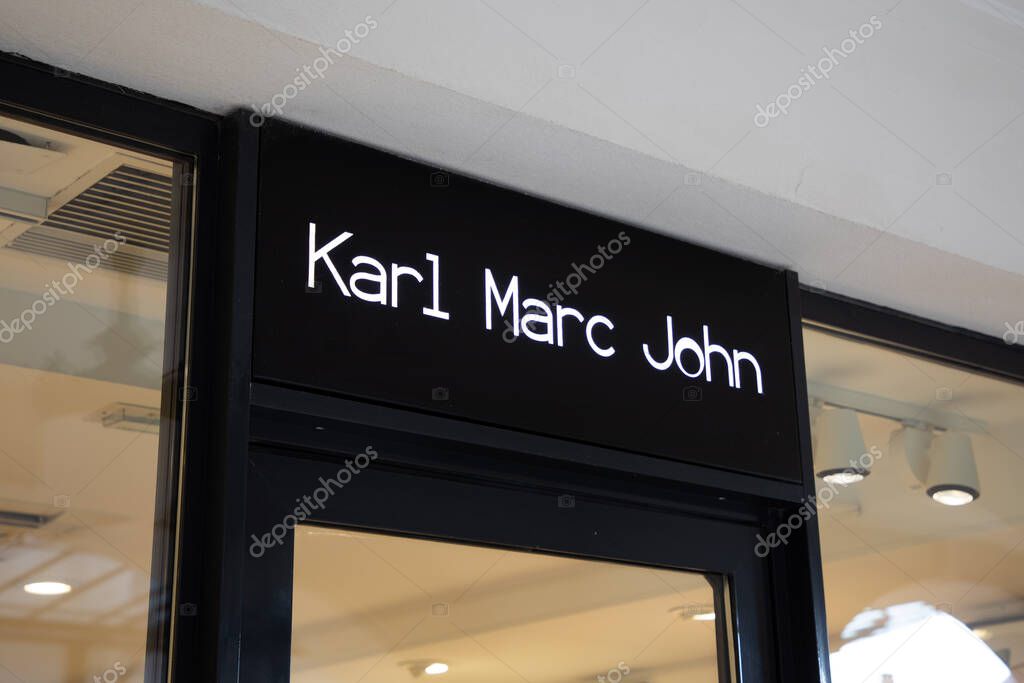 Arcachon , France -  02 12 2024 : Karl Marc John chain logo text and sign brand on city shop facade fashion clothes
