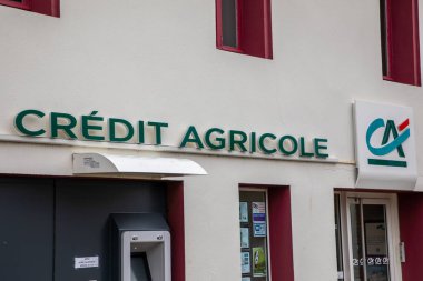 Bordeaux, Fransa - 02 29 2024: ca sign letters text and brand logo of Credit Agricole French bank and ATM on the entry wall facade office