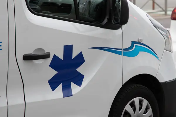 Ambulance car with star blue cross of life emblem logo sign on rescue truck ambulance van rescue victims car
