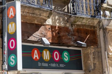 Bordeaux , France -  03 12 2024 : AMOS Emmaus sign text and brand logo clothes boutique solidarity movement clipart