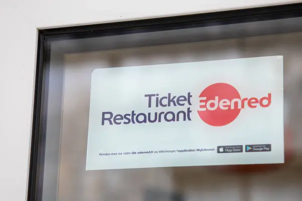 stock image Bordeaux , France -  04 10 2024 : Ticket Restaurant Edenred brand logo and text sign card on windows entrance city bar restaurant