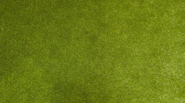 Yeşil çimen plastik çimen çimen dokusu doğanın üst görünüm arkaplanı
