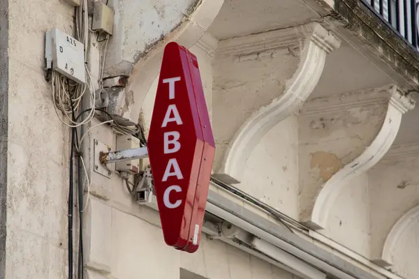 stock image Bordeaux , France -  08 01 2024 : tabac seller text white brand neon sign and red logo French store wall facade signboard tobacco shop