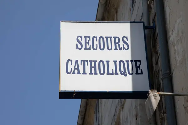 Stock image La Rochelle , France - 07 26 2024 : Secours catholique france logo sign and brand text of french Rescue Catholic help solidarity homeless office