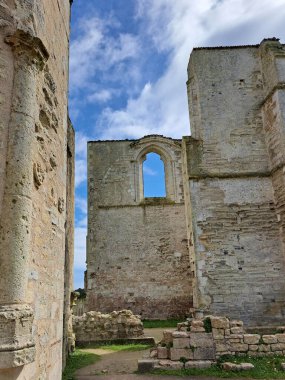 ruin of Xl century abbey des chateliers on the island of ile de re in france clipart