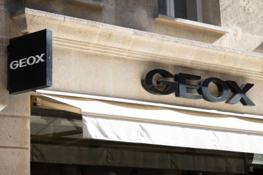 Bordeaux, France -  10 29 2024 : geox brand text shop and sign logo on facade store fashion entrance in street view clipart