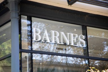 Arcachon, France -  10 24 2024 : Barnes logo text and brand sign of International property chain consultant of Realty global luxury real estate windows office clipart