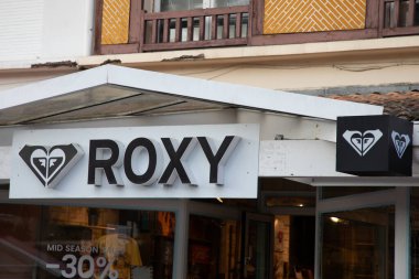 Bordeaux , France - 11 15 2024 : roxy logo sign and brand text on wall store facade clothing chain shop entrance fashion clipart