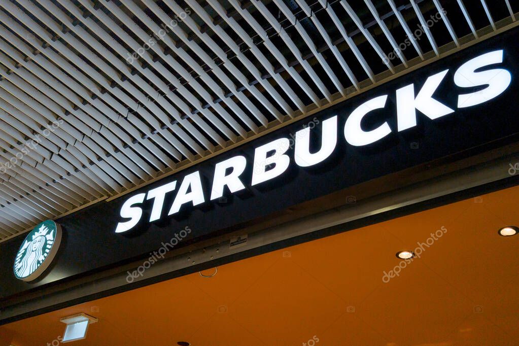 Bordeaux , France - 11 21 2024 : Starbucks cafe brand text store coffee house entrance logo sign front shop us chain facade