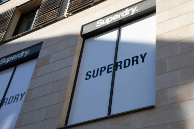 Bordeaux , France - 02 10 2025 : Superdry text brand and sign logo facade front chain of british shop clothing company clipart