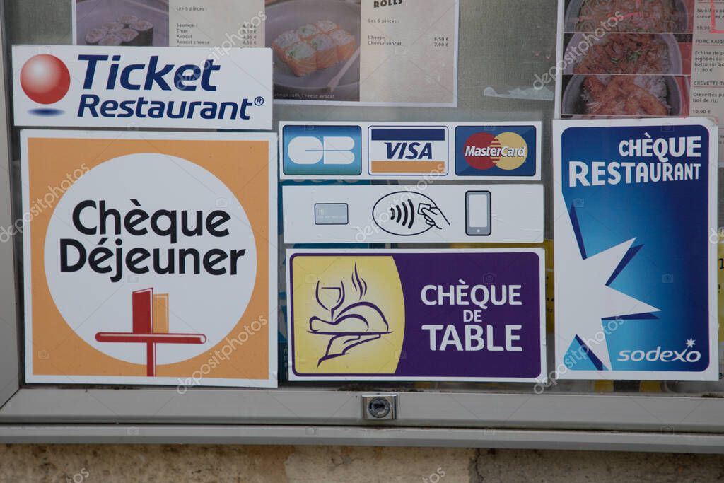 Bordeaux , France - 02 28 2025 : Ticket Restaurant Edenred brand cheque dejeuner logo and text cheque de table sign and CB visa mastercard brand signage fr