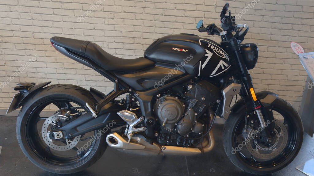 Bordeaux , France -  31 03 2025 : triumph trident black model with brand text sign and logo on fuel tank gas motorcycle side