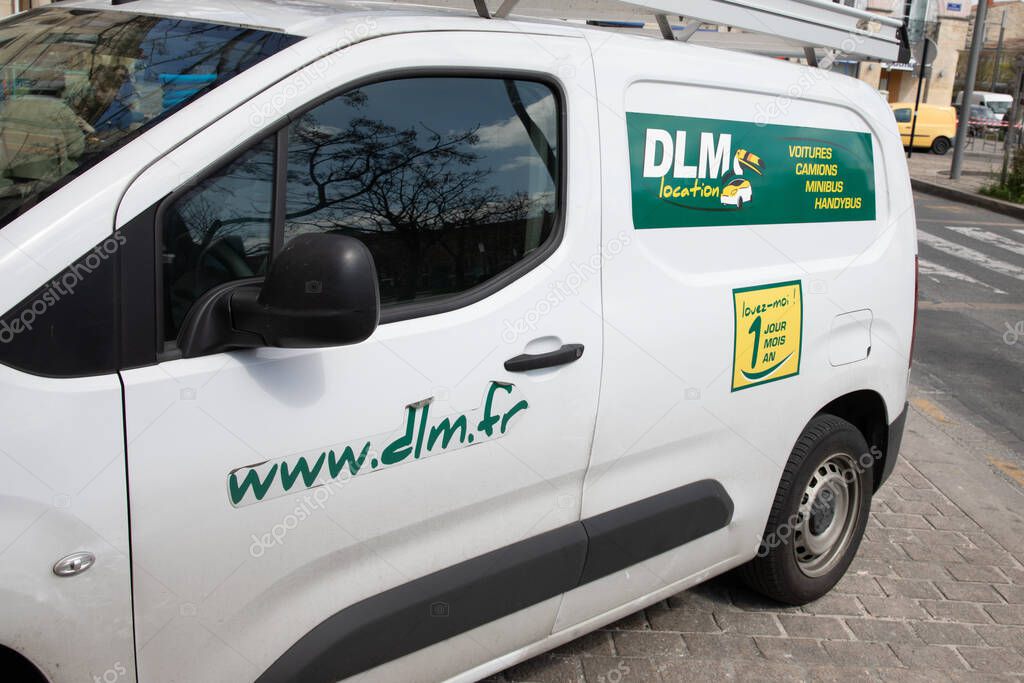 Bordeaux , France -  31 03 2025 : dlm location logo brand and text sign on white panel van truck of mobility rental truck agency vehicle