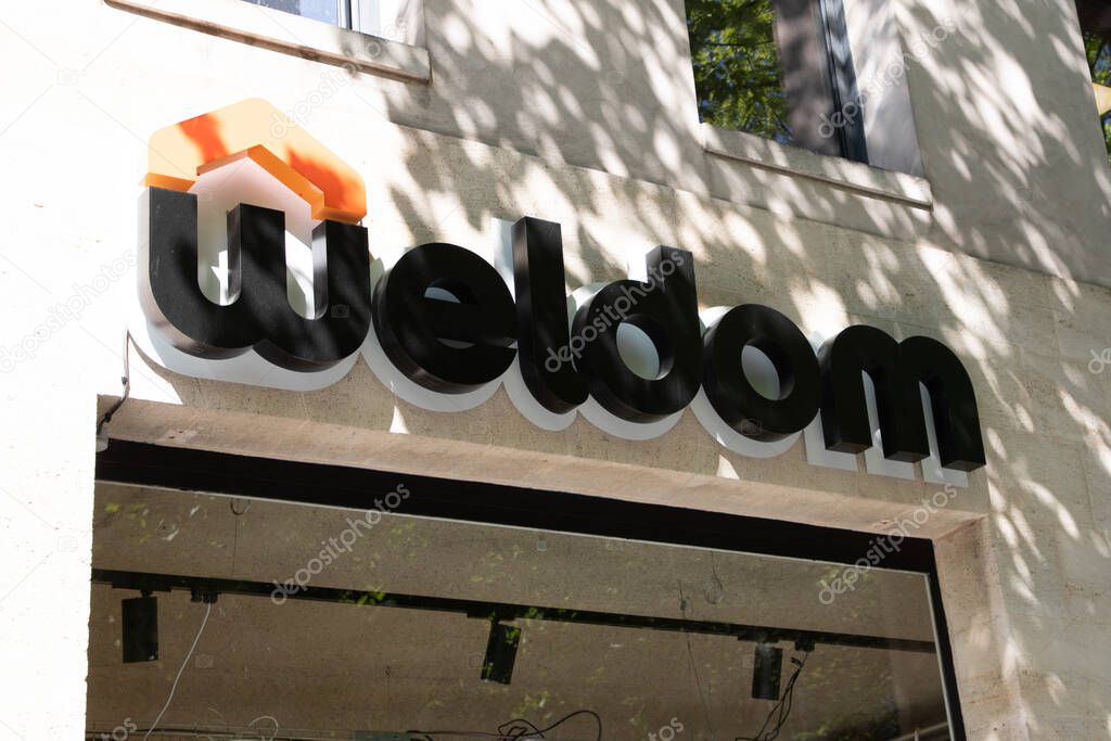 Bordeaux ,  France - 04 10 2025 : weldom store facade text brand of DIY stores with w logo sign on shop front entrance