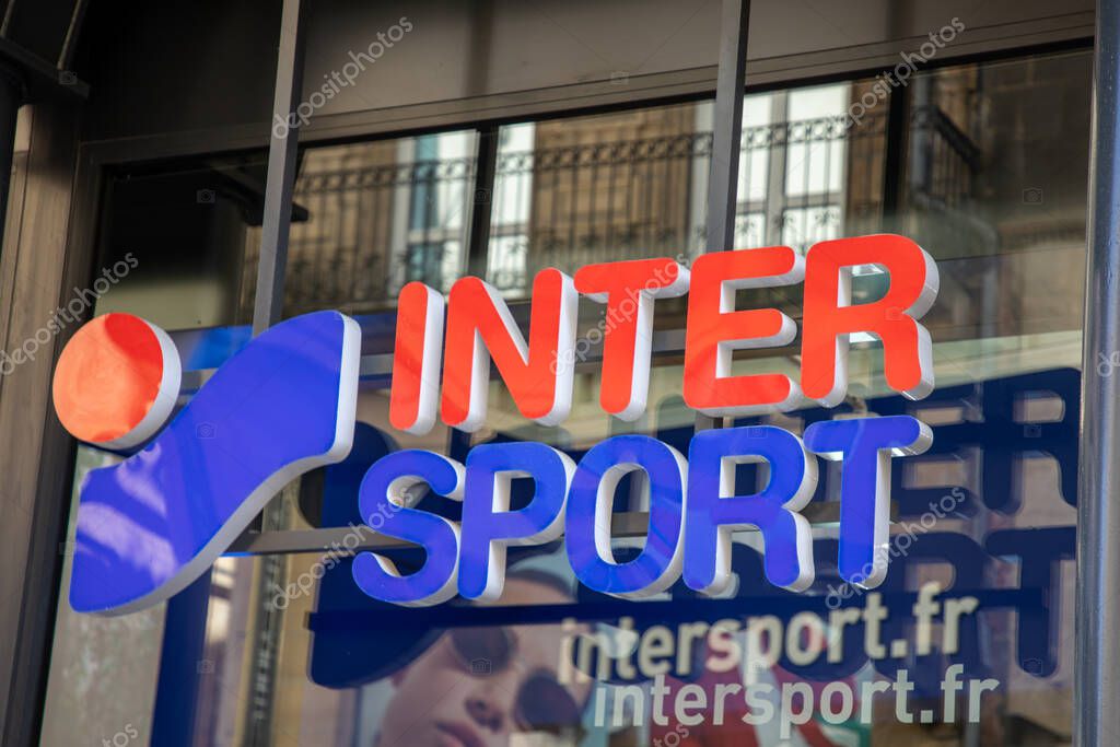 Bordeaux ,  France - 04 10 2025 : intersport sporty brand sign and text logo facade wall sport chain store international shop sporting goods retailer entrance