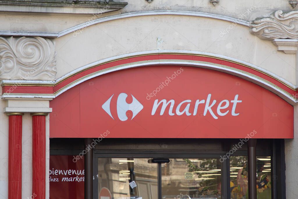 Bordeaux , France -  04 14 2025 : carrefour market logo sign and brand text city center facade town chain store entrance shop supermarket french