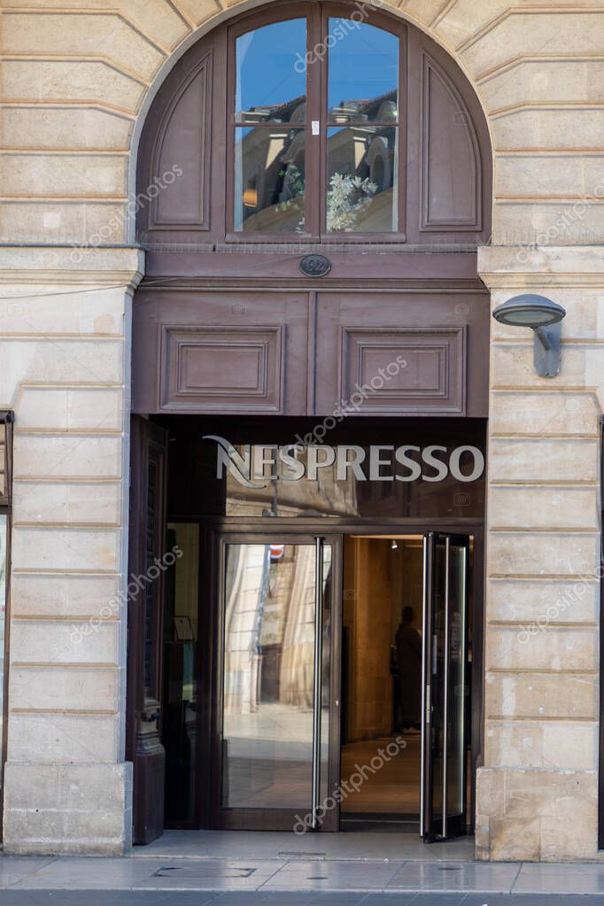 Bordeaux , France -  04 14 2025 : nespresso storefront entrance logo sign and text brand of coffee machines front facade shop on store capsules and accessories
