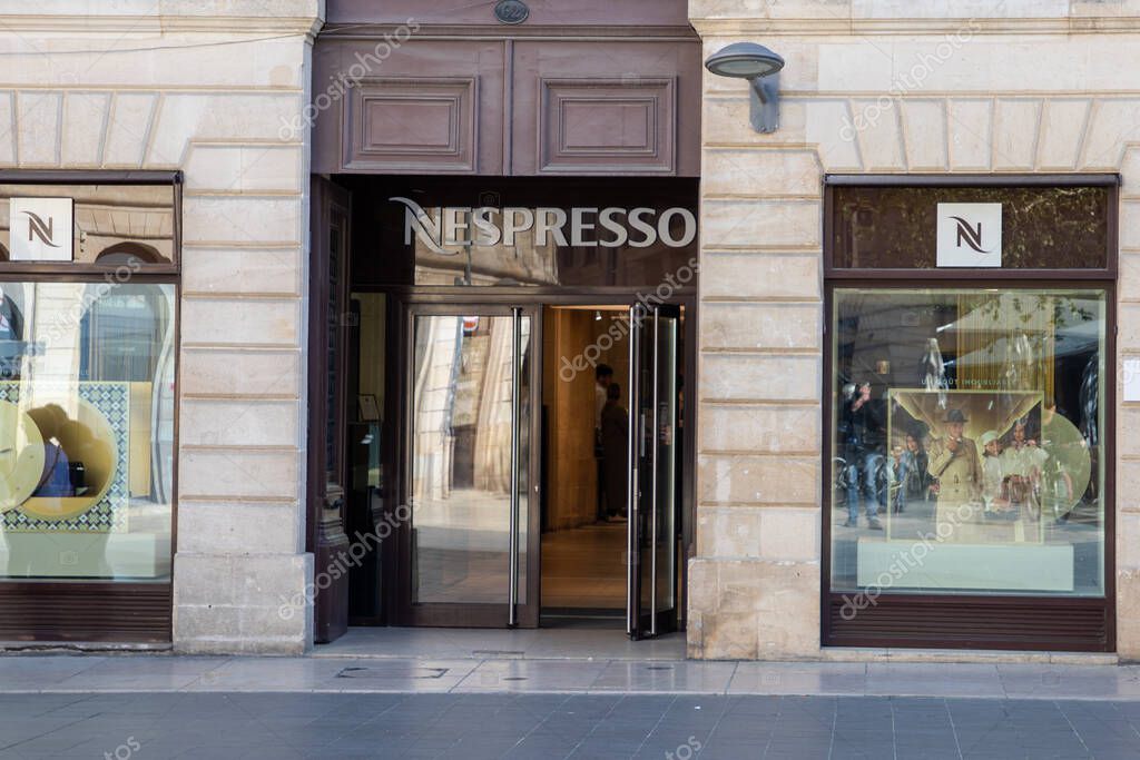 Bordeaux , France -  04 14 2025 : nespresso storefront brand logo and text sign wall chain facade shop windows coffee machines capsules and accessories store