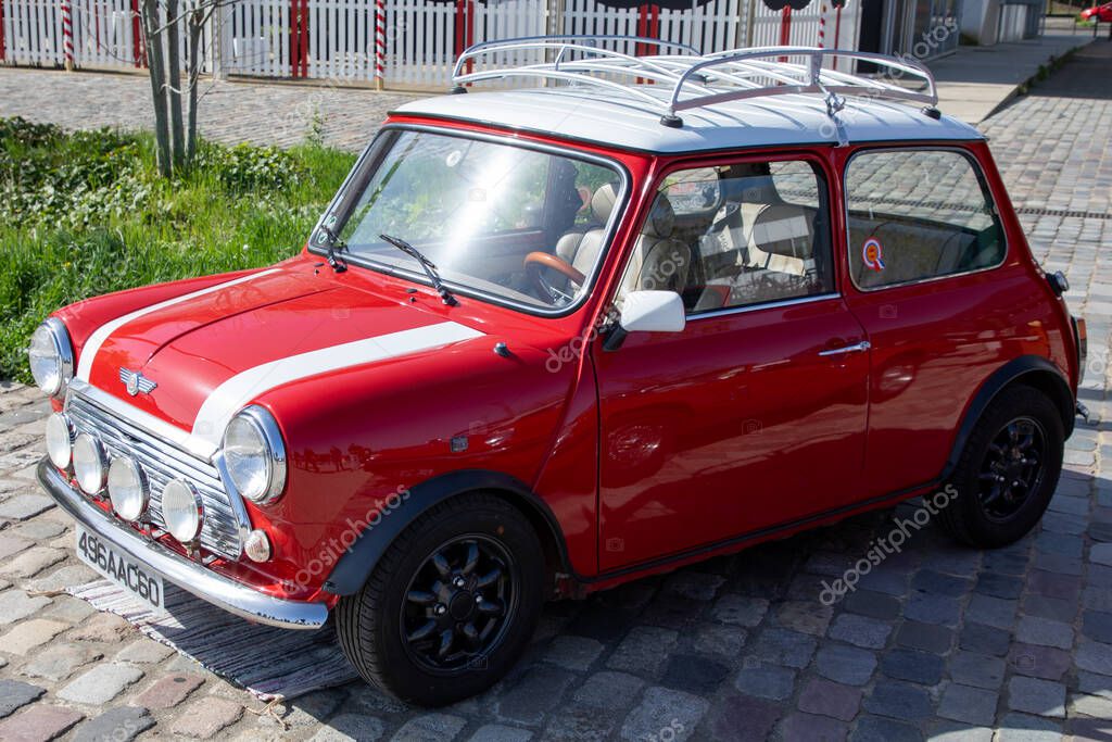 Bordeaux , France - 04 19 2025 : mini cooper car red vintage oldtimer racing classic car british vehicle gb