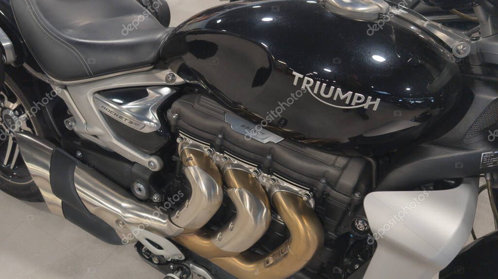 Bordeaux , France - 04 22 2025 : triumph black model with brand text sign and logo on fuel tank gas motorcycle side