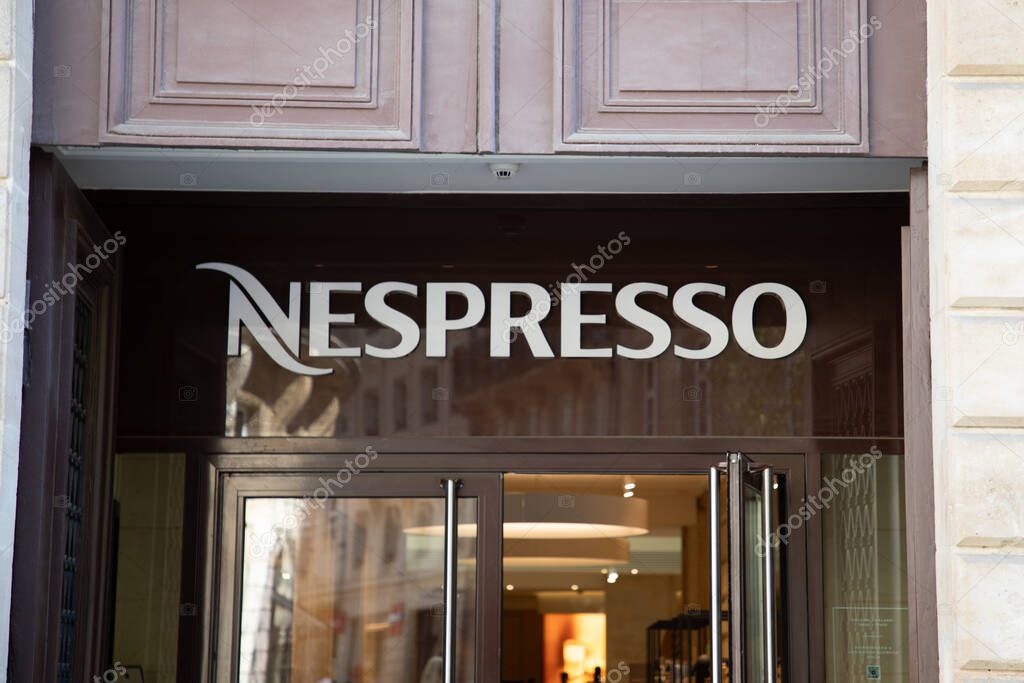 Bordeaux , France -  04 23 2025 : nespresso storefront entrance logo sign windows and text brand of coffee machines front facade shop on store capsules and accessories