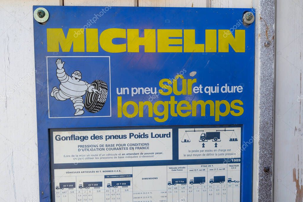Bordeaux , France -  04 30 2025 : michelin brand logo and text sign old recommended tire pressure board advertising board of french tyre station garage car