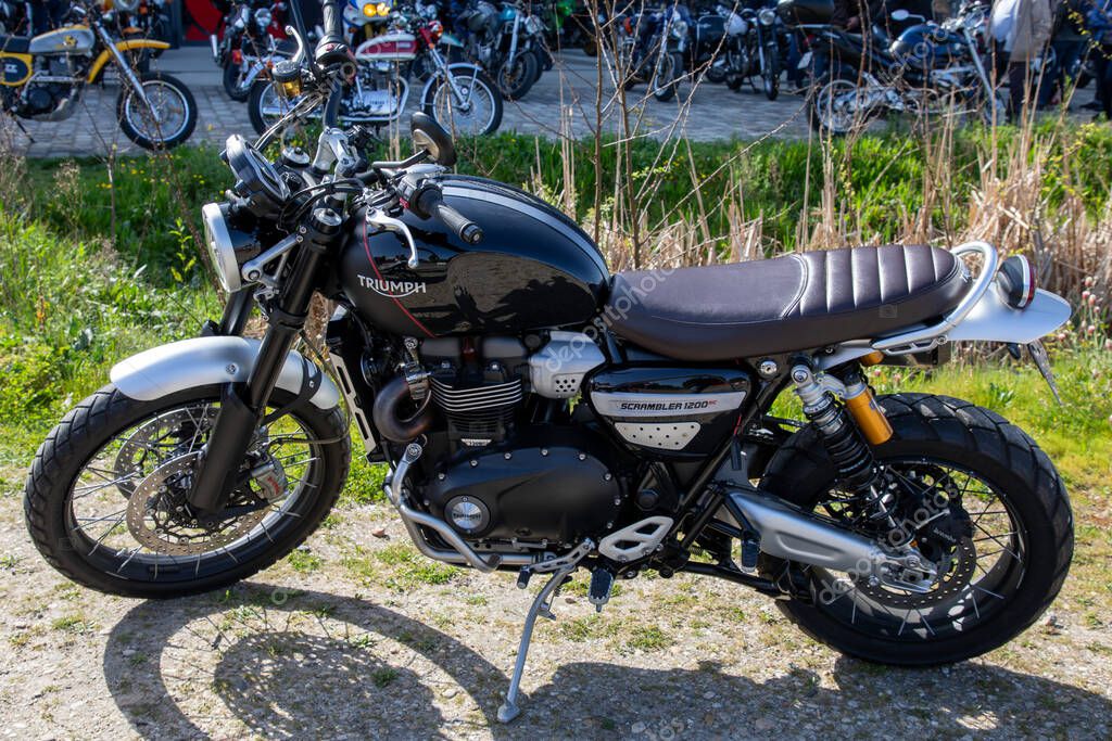 Bordeaux , France - 05 03 2025 : triumph scrambler 1200 xc logo brand and text sign motorcycle side view motorbike classic