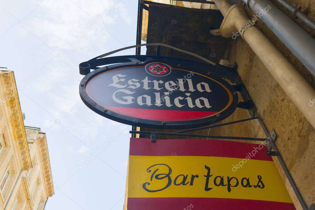 Bordeaux , France - 05 05 2025 : estrella galicia logo and text sign of brand of spain pale lager beer panel front facade bar tapas
