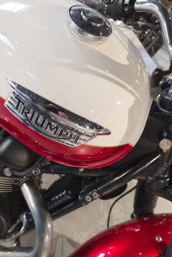 Bordeaux, france - 05 05 2025 : triumph motorcycle bonneville british vintage retro neo motorbike sign text and logo brand on white red fuel tank neo retro bike