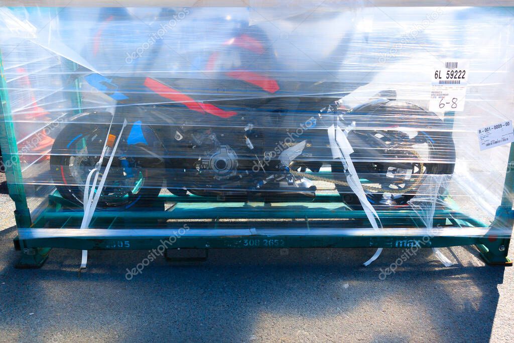 Bordeaux , France -  05 13 2025 : BMW m S1000 R motorcycle in delivery crate to dealer with protective film and metal pallet motorbike sport racing 1000 bike